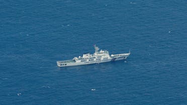A Chinese Coast Guard vessel is pictured near the Philippine-occupied Thitu Island, in the disputed Spratly Islands, South China Sea, on March 9, 2023. (Reuters)