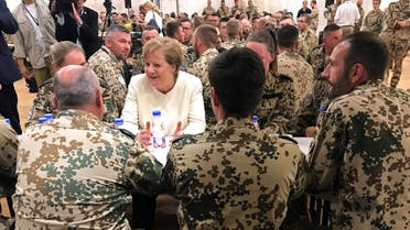 German Chancellor Angela Merkel talks with troops in Gao, Mali May 2, 2019.ÊREUTERS/Andreas Rinke