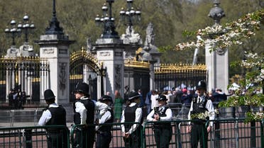 Police officers stand on duty close to Buckingham Palace in central London, on May 3, 2023 as preparations continue ahead of the May 6 Coronation of King Charles III. (AFP)