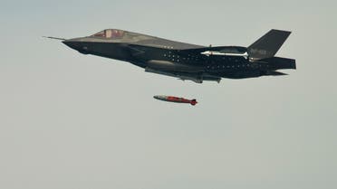 BF-3, a short take-off and vertical landing F-35 Lightning II, releases an inert 1,000 lb. GBU-32 Joint Direct Attack Munition (JDAM) separation weapon over water in an Atlantic test range in Patuxent River, Maryland August 8, 2012. (File photo: Reuters)