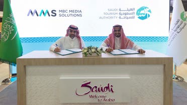Ahmed al-Sahhaf, MMS CEO and Raad al-Khanbashi, VP of Marketing and Communications, MEA Markets, STA sign an MoU at the ATM in Dubai. (Supplied)