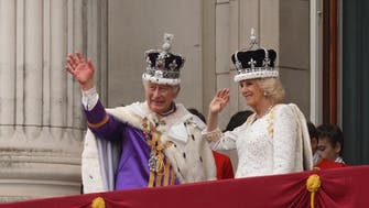 King Charles waves from balcony of Buckingham Palace after coronation ceremony