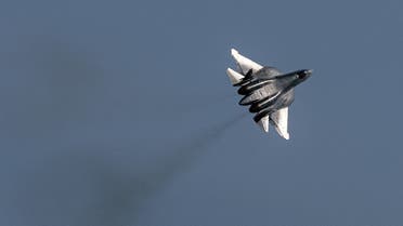 A Russian Sukhoi Su-57 fifth-generation jet fighter performs during an air show at the MAKS 2021 International Aviation and Space Salon, in Zhukovsky, outside Moscow, on July 20, 2021. (AFP)