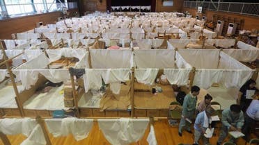 Shigeru Ban built paper partitioning system for flooding victims in Japan. (Twitter)