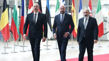 (L to R) Azerbaijan’s President Ilham Aliyev, President of the European Council Charles Michel and Armenian Prime Minister Nikol Pashinyan arrive at the European Council in Brussels for talks on May 14, 2023. (AFP)