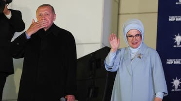 Turkish President Tayyip Erdogan, accompanied by his wife Ermine Erdogan, greets supporters at the AK Party headquarters in Ankara, Turkey May 15, 2023. REUTERS/Umit Bektas