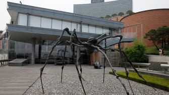 Giant spider sculpture fetches record $32.8 million at auction                     