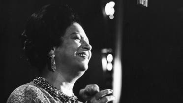Egyptian singer Umm Kulthum performing to an audience of 2,200 at the Olympia Music Hall in France on Nov. 14, 1967. (AP Photo/Jacques Marqueton)