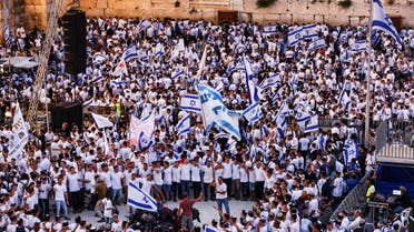 Israelis gather and dance by the Western Wall in Jerusalem's Old city as they mark Jerusalem Day, in Jerusalem May 18, 2023. (Reuters)