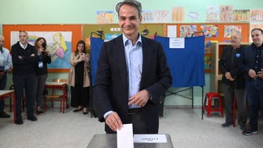 Greek Prime Minister and leader of right wing party New Democracy, Kyriakos Mitsotakis casts his ballot at a polling station during the general election in Athens on May 21, 2023. (AFP)
