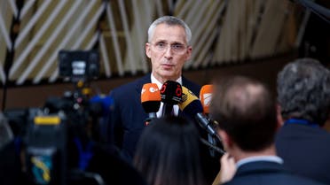 NATO Secretary General Jens Stoltenberg speaks to journalists as he arrives for a Foreign Affairs Council at the EU headquarters in Brussels on May 23, 2023. (Photo by Kenzo TRIBOUILLARD / AFP)