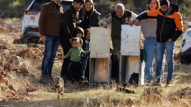 A 10-month-old female Iberian lynx, a feline in danger of extinction, named Terra is released as her mother Ilexa waits inside a cage, with other three lynxes, as part of the European project 'Life LynxConnect' to recover this species in Arana mountain range, in Iznalloz, near Granada, southern Spain December 19, 2022. REUTERS/Jon Nazca