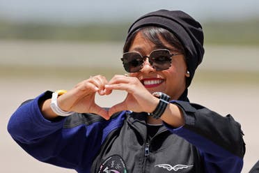 Crew member Rayyanah Barnawi representing Saudi Arabia gestures before the planned Axiom Mission 2 (Ax-2) launch to the International Space Station at Kennedy Space Center, Florida, U.S. May 21, 2023. (Reuters)