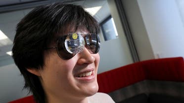 Bryan Chiang, a 22-year-old computer science major and aspiring start-up creator, wears an augmented reality eyepiece equipped with RizzGPT in San Francisco, California, US, on May 11, 2023. (Reuters)