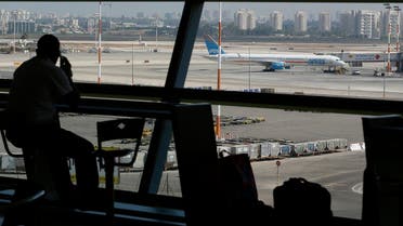 A passenger looks out of a window at Ben Gurion International airport, near Tel Aviv (File Photo: Reuters)