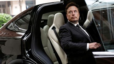 Tesla Chief Executive Officer Elon Musk gets in a Tesla car as he leaves a hotel in Beijing, China May 31, 2023. (Reuters)