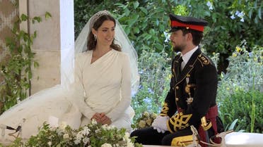 Jordan's Crown Prince Hussein and Rajwa Al Saif are seen together at their royal wedding ceremony, in Amman, Jordan, June 1, 2023 in this screen grab taken from a video. Royal Hashemite Court (RHC)/Handout via REUTERS ATTENTION EDITORS - THIS IMAGE WAS PROVIDED BY A THIRD PARTY. NO RESALES. NO ARCHIVES.