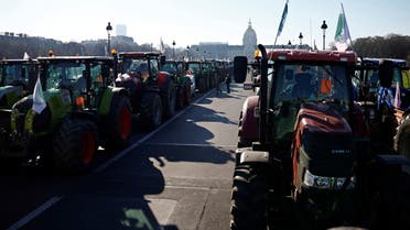 French farmers gather with their tractors near the Invalides during a protest over pesticide restrictions and other environmental regulations they say are threatening agricultural production, in Paris, France, February 8, 2023. REUTERS/Sarah Meyssonnier