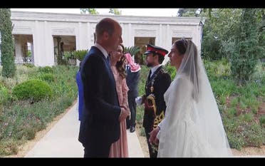 Britain’s Prince William and Princess Catherine meet Jordan’s Crown Prince Al Hussein and Rajwa Al Saif at their royal wedding ceremony, in Amman, Jordan, on June 1, 2023 in this screen grab taken from a video. (Reuters)