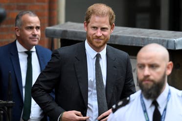 Britain s Prince Harry walks outside the High Court, in London, Britain March 30, 2023. (Reuters)