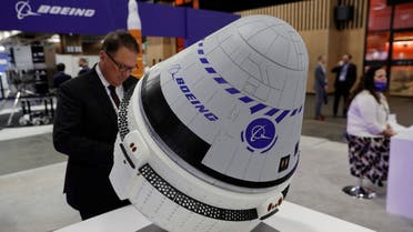A visitor looks at a model of the Boeing Starliner astronaut capsule at the International Astronautical Congress (IAC) space exploration conference in Paris, France, September 20, 2022. REUTERSPascal