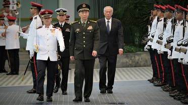 Chinese Defence Minister Li Shangfu reviews the guard of honor at the Ministry of Defence in Singapore, June 1, 2023. Singapore Ministry of Defence/Handout via REUTERS THIS IMAGE HAS BEEN SUPPLIED BY A THIRD PARTY. NO RESALES. NO ARCHIVES.