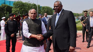 US Secretary of Defense Lloyd Austin shakes hands with India's Defense Minister Rajnath Singh on the day of his ceremonial reception in New Delhi, India, on June 5, 2023. (Reuters)