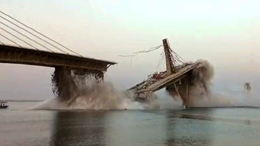 This photo taken on June 4, 2023, shows an under construction bridge collapsing into the river Ganges in Bhagalpur district in India's eastern state of Bihar. (AFP)
