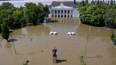 A view shows the House of Culture on a flooded street in Nova Kakhovka after the nearby dam was breached in the course of Russia-Ukraine conflict, in the Kherson Region, Russian-controlled Ukraine, June 6, 2023. (Reuters)