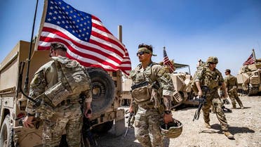 US soldiers patrol the countryside of Rumaylan (Rmeilan) in Syria's northeastern Hasakeh province on June 7, 2023. (AFP)