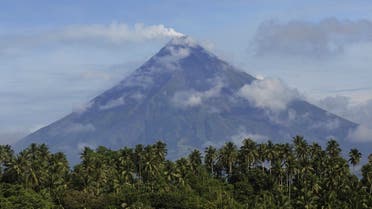 A general view shows Mayon volcano as it spews white smoke into the air in Legaspi City, Albay province on October 21, 2022. (Photo by Charism SAYAT / AFP)