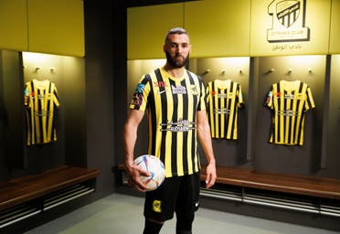 The French striker wears the yellow and black kit of Al-Ittihad Club for the first time