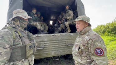Founder of Wagner private mercenary group Yevgeny Prigozhin speaks with servicemen during withdrawal of his forces from Bakhmut and handing over their positions to regular Russian troops, in the course of Russia-Ukraine conflict in an unidentified location, Russian-controlled Ukraine, in this still image taken from video released June 1, 2023. Press service of Concord/Handout via REUTERS ATTENTION EDITORS - THIS IMAGE WAS PROVIDED BY A THIRD PARTY. NO RESALES. NO ARCHIVES. MANDATORY CREDIT.