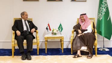 Saudi Arabia’s Foreign Minister Prince Faisal bin Farhan meets with his Syrian counterpart Faisal Mekdad. (Twitter)