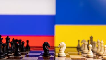 Chess pieces are seen in front of displayed Russia and Ukraine flags in this illustration taken January 25, 2022. (Reuters)