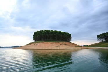 Shows an island formed inside Thac Ba hydropower lake in Yen Bai province. Vietnam, which relies on hydropower for almost half its energy needs, June 13, 2023. (AFP)