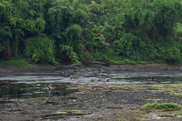 Local residents fishing on Chay river at the lower section of Thac Ba hydropower dam in Yen Bai province. After a series of heatwaves, including a record high in May, June 14, 2023. (AFP)