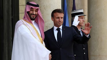 French President Emmanuel Macron shakes hands with Saudi Arabia's Crown Prince and Prime Minister Mohammed bin Salman Al-Saud at the Elysee Palace in Paris, France, June 16, 2023. (Reuters)