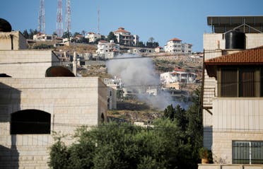 Smoke is seen rising into the air during an Israeli raid in Jenin, in the Israeli-occupied West Bank June 19, 2023. (Reuters)
