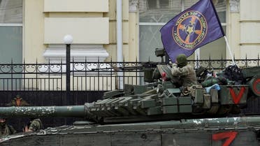 Members of Wagner group sit atop of a tank in a street in the city of Rostov-on-Don, on June 24, 2023. (AFP)
