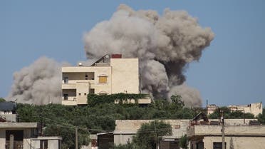 A plume of smoke rises from a building following a reported Russian air strike on Syria’s northwestern rebel-held Idlib province, on June 25, 2023. (AFP)