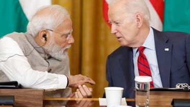 President Joe Biden and India's PM Narendra Modi talk at the White House, June 23, 2023. (Reuters)