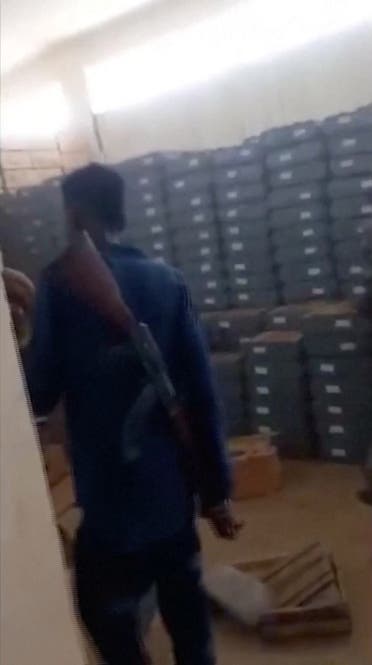 A photo from last June shows the RSF in a police weapons depot in Khartoum