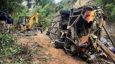 This handout picture released by the Tlaxiaco Municiapl Police shows the remains of a bus after it plummeted into a ravine in the outskirts of Magdalena Peñasco, Oaxaca state, Mexico on July 5, 2023.
