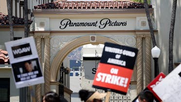 Striking WGA (Writers Guild of America) workers picket outside Paramount Studios on July 12, 2023 in Los Angeles, California. (AFP)