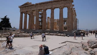 Greece briefly shuts Acropolis site to shield tourists from heatwave