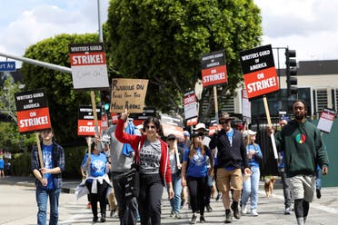 Workers and supporters of the Writers Guild of America protest outside Universal Studios Hollywood after union negotiators called a strike for film and television writers, in the Universal City area of Los Angeles, California, U.S., May 3, 2023. (File photo: Reuters)