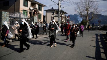 PREVIEW Relatives and neighbours attend the funeral of a woman surnamed Liu, as coronavirus disease (COVID-19) outbreak continues, at a village in Tonglu county, Zhejiang province, China, January 9, 2023. REUTERS/Aly Song