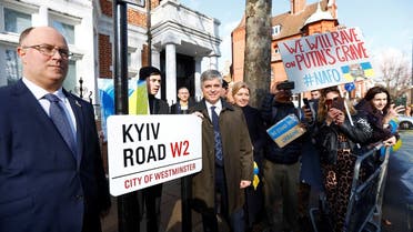 Ukraine’s Ambassador to the UK Vadym Prystaiko and his wife Inna attend the unveiling of a Kyiv Road street sign, installed by Westminster City Council, opposite the Russian Embassy, in London, Britain, on February 24, 2023. (Reuters)