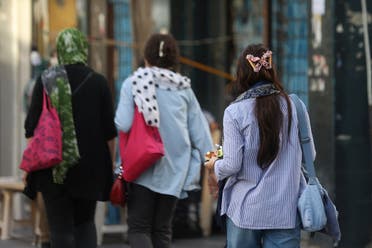 Iranian women walk on a street during the revival of morality police in Tehran, Iran, July 16, 2023. (West Asia News Agency via Reuters) 